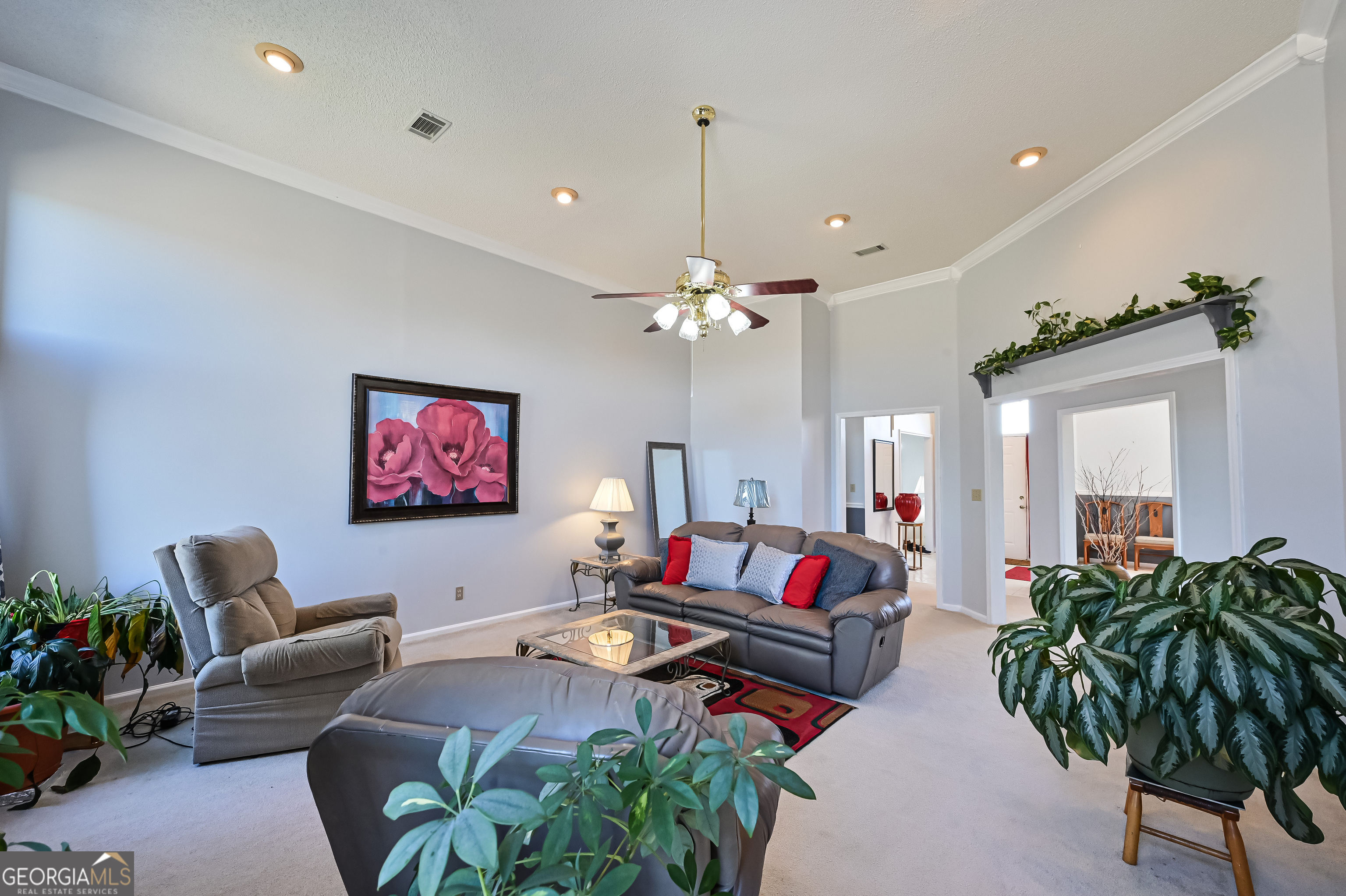 5152 Sandy Bottom Road Blakely, GA 39823 - Photo 20 of 40 a living room with furniture and a chandelier