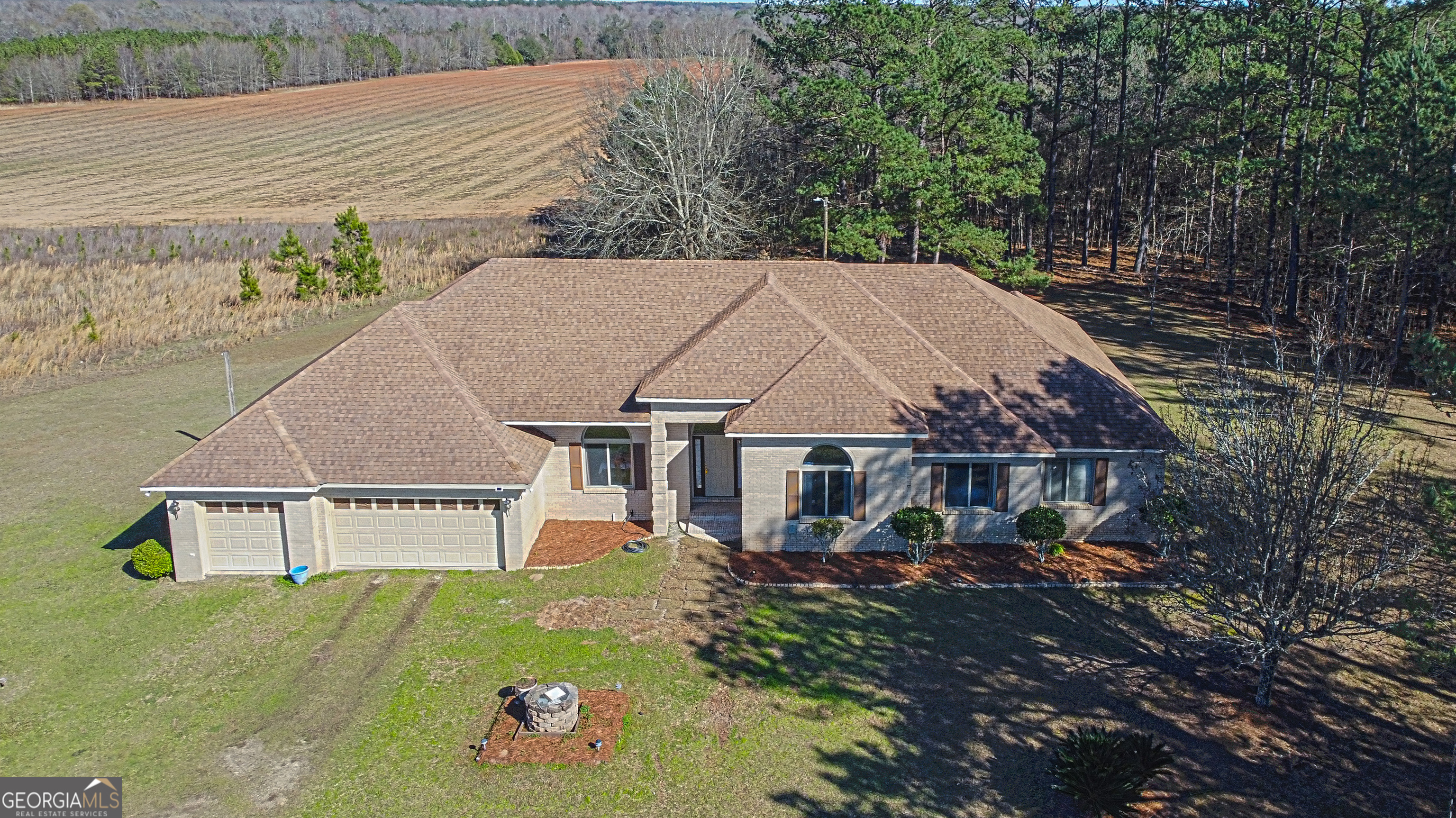 5152 Sandy Bottom Road Blakely, GA 39823 - Photo 2 of 40 an aerial view of a house with swimming pool and patio
