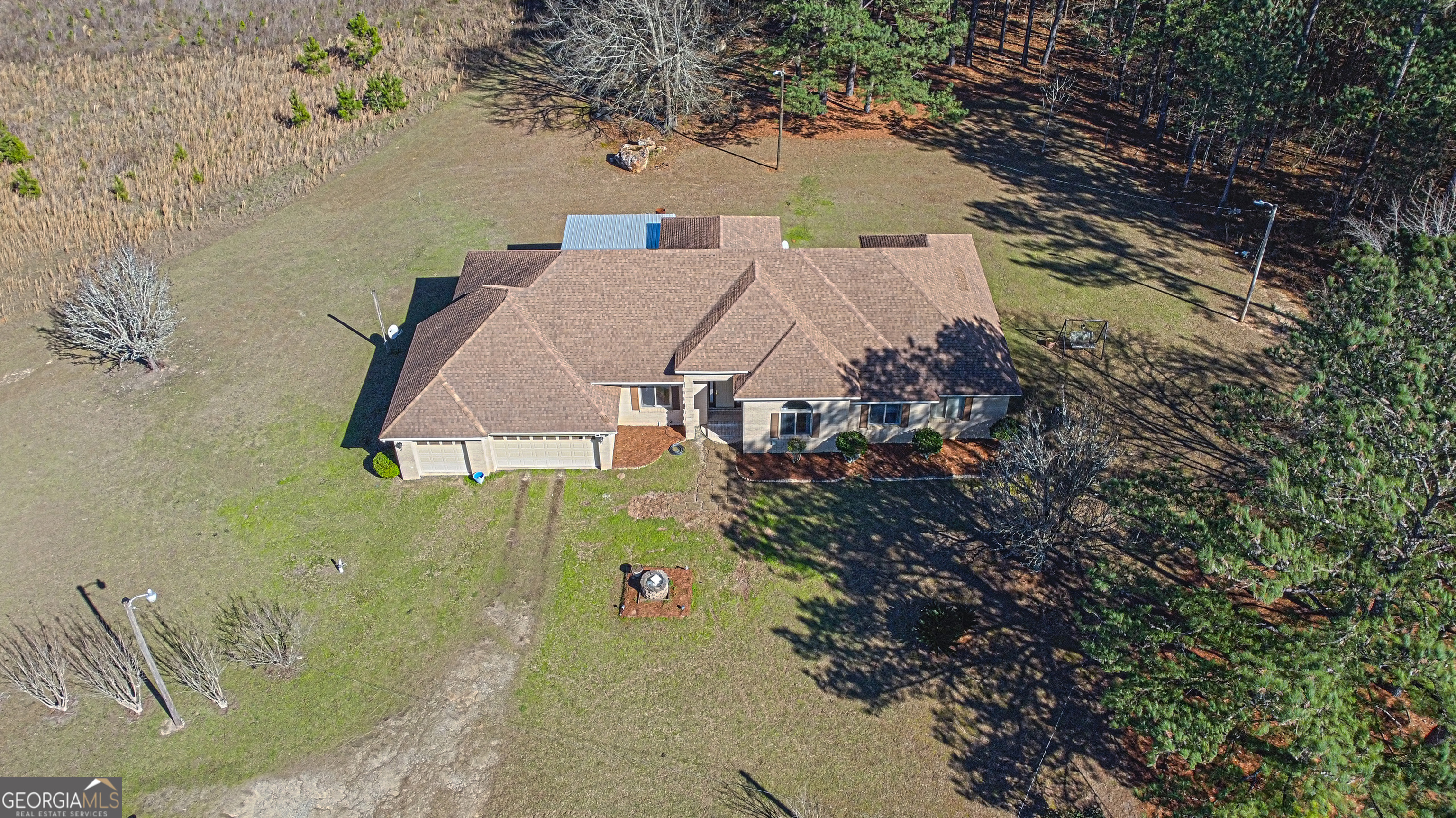 5152 Sandy Bottom Road Blakely, GA 39823 - Photo 3 of 40 an aerial view of residential house with outdoor space and trees all around