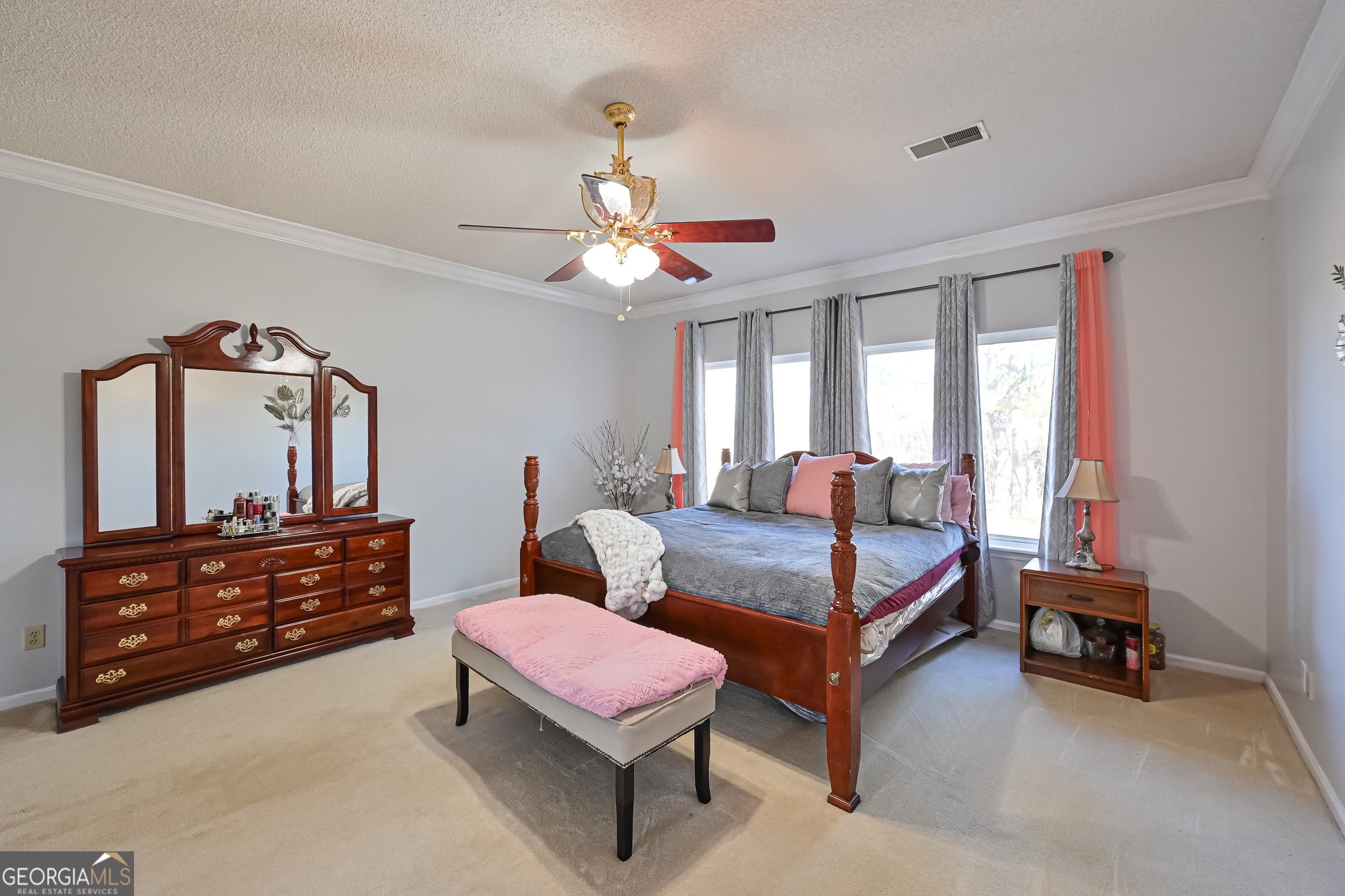 5152 Sandy Bottom Road Blakely, GA 39823 - Photo 34 of 40 a bedroom with furniture and a dresser