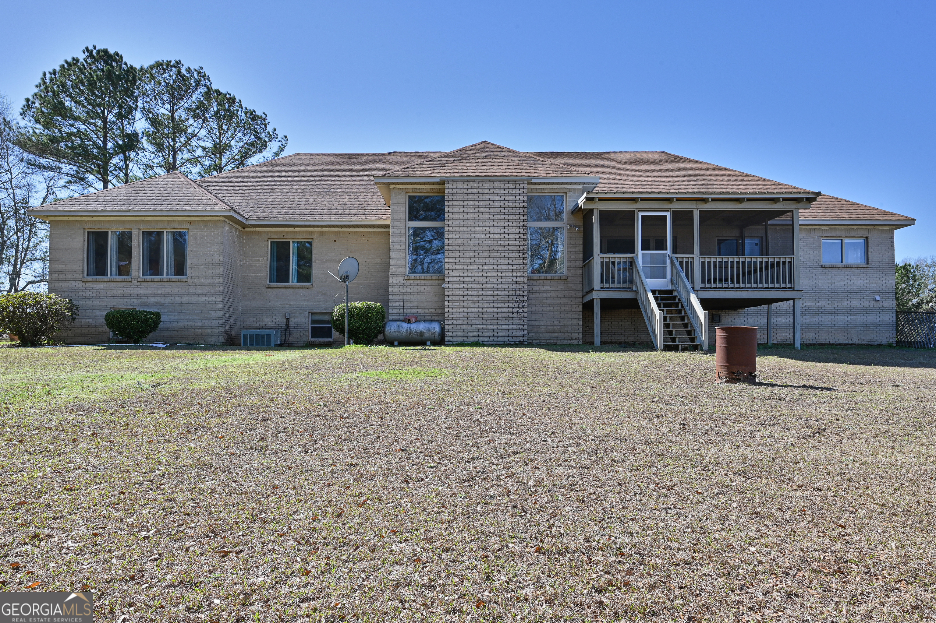 5152 Sandy Bottom Road Blakely, GA 39823 - Photo 7 of 40 a front view of a house with a yard