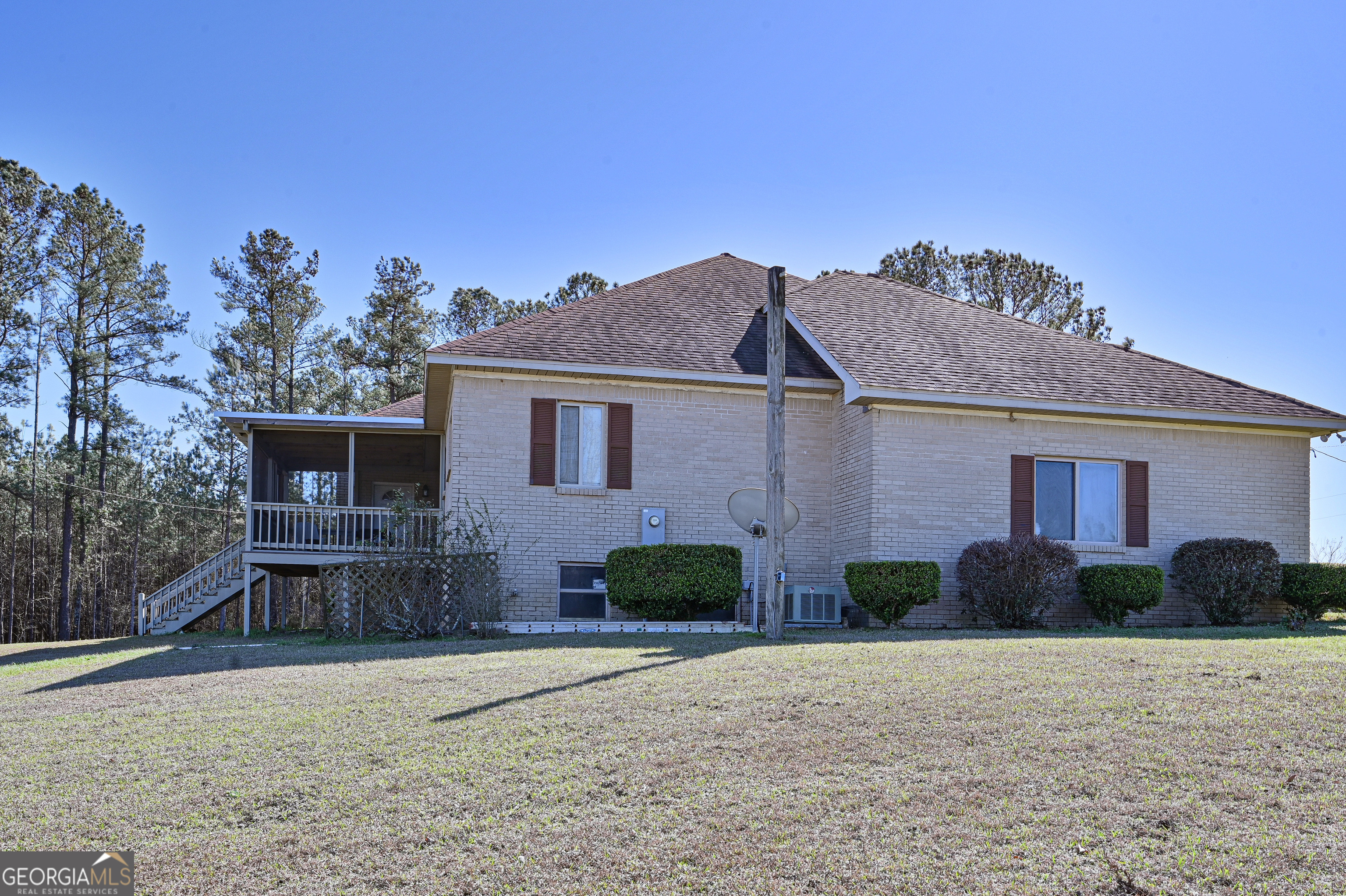 5152 Sandy Bottom Road Blakely, GA 39823 - Photo 9 of 40 a front view of a house with garden