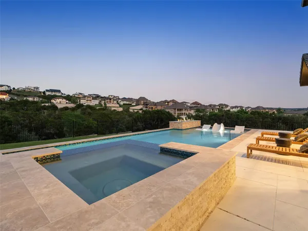 a view of a swimming pool and lake view