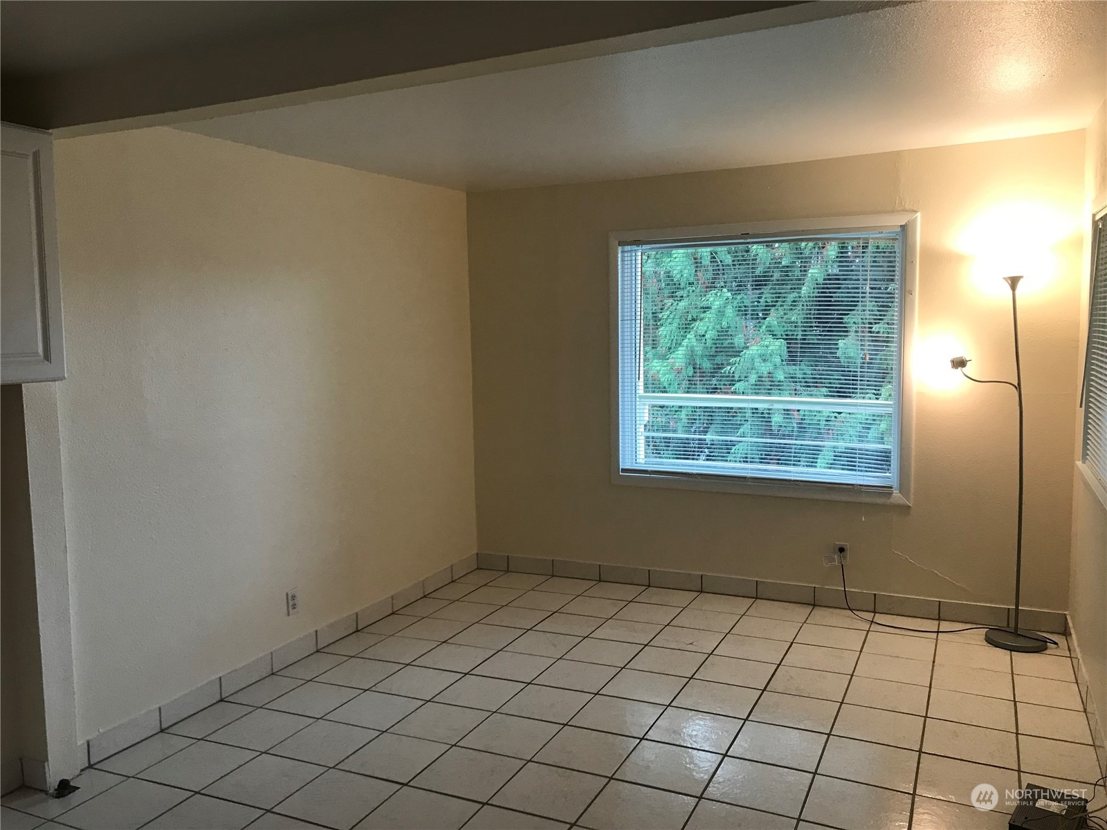 3843 22nd Avenue Southwest Seattle, WA 98106 - Photo 13 of 21 a view of an empty room and window