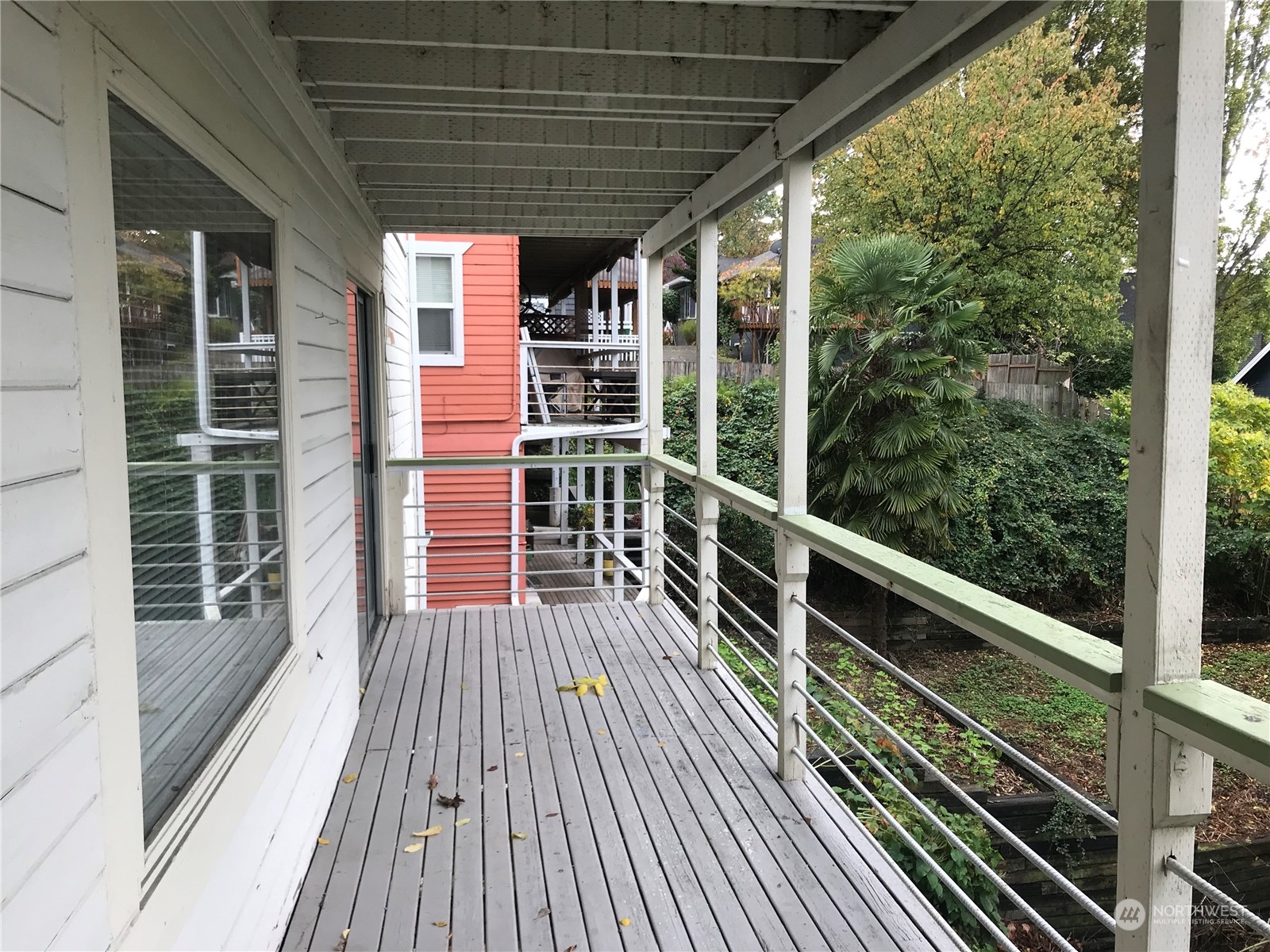3843 22nd Avenue Southwest Seattle, WA 98106 - Photo 21 of 21 a view of balcony with wooden floor and fence