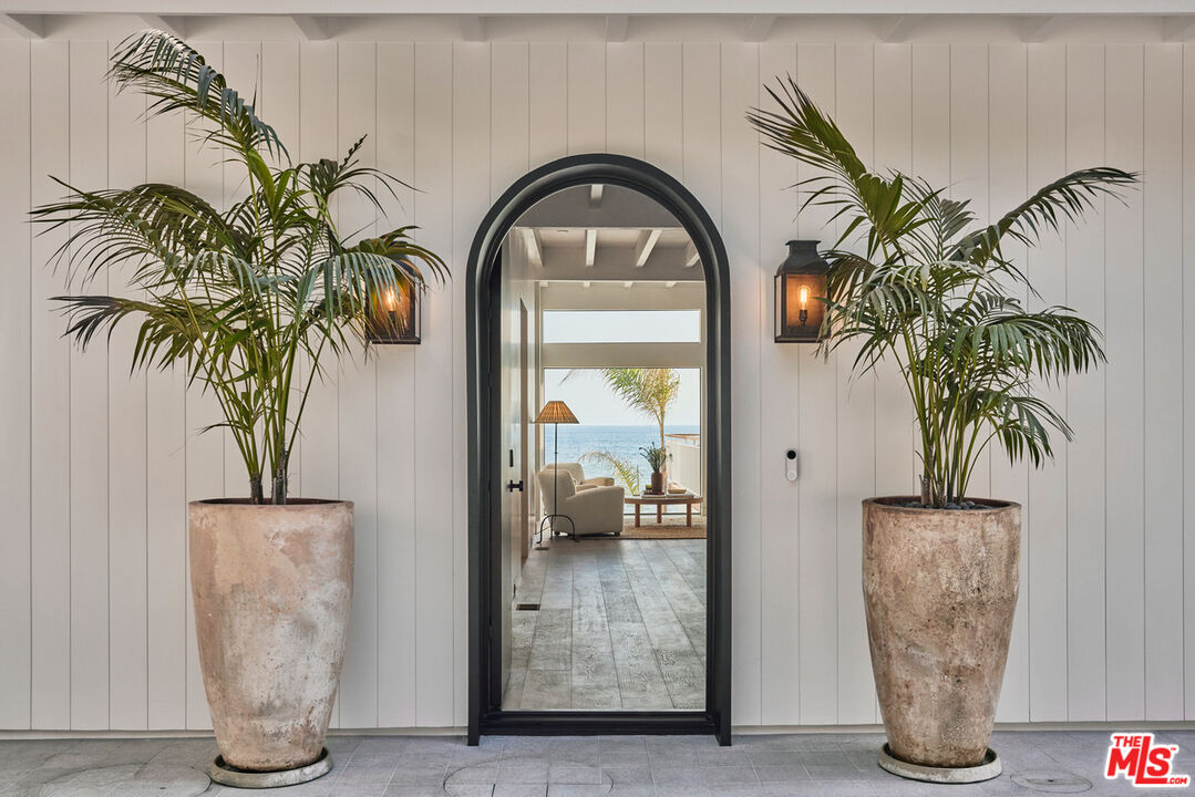 27356 Escondido Beach Road Malibu, CA 90265 - Photo 1 of 17 a view of front door with potted plant
