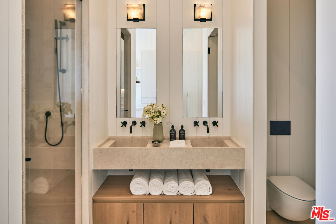 27356 Escondido Beach Road Malibu, CA 90265 - Photo 11 of 17 a bathroom with a sink and a mirror