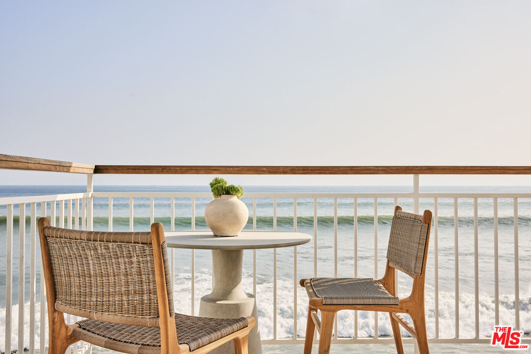 27356 Escondido Beach Road Malibu, CA 90265 - Photo 13 of 17 a view of roof deck with chair and wooden floor