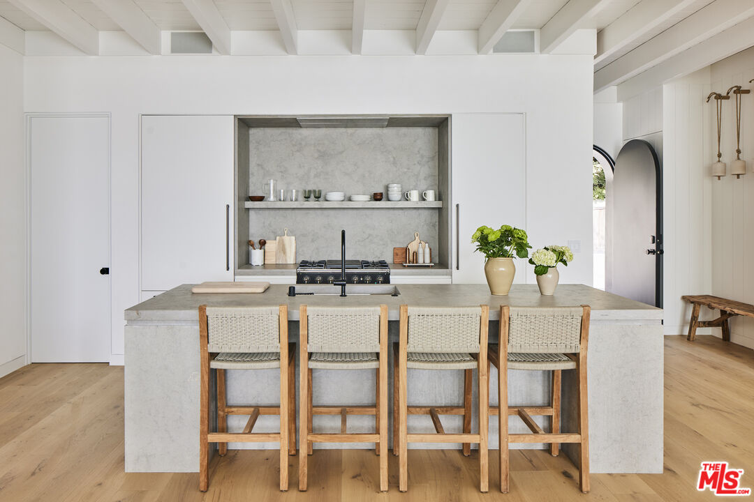27356 Escondido Beach Road Malibu, CA 90265 - Photo 8 of 17 a dining room with furniture and wooden floor