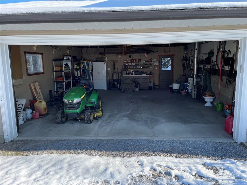 506 Lake Wilhelm Road Sandy Lake, PA 16145 - Photo 19 of 42 a view of a garage