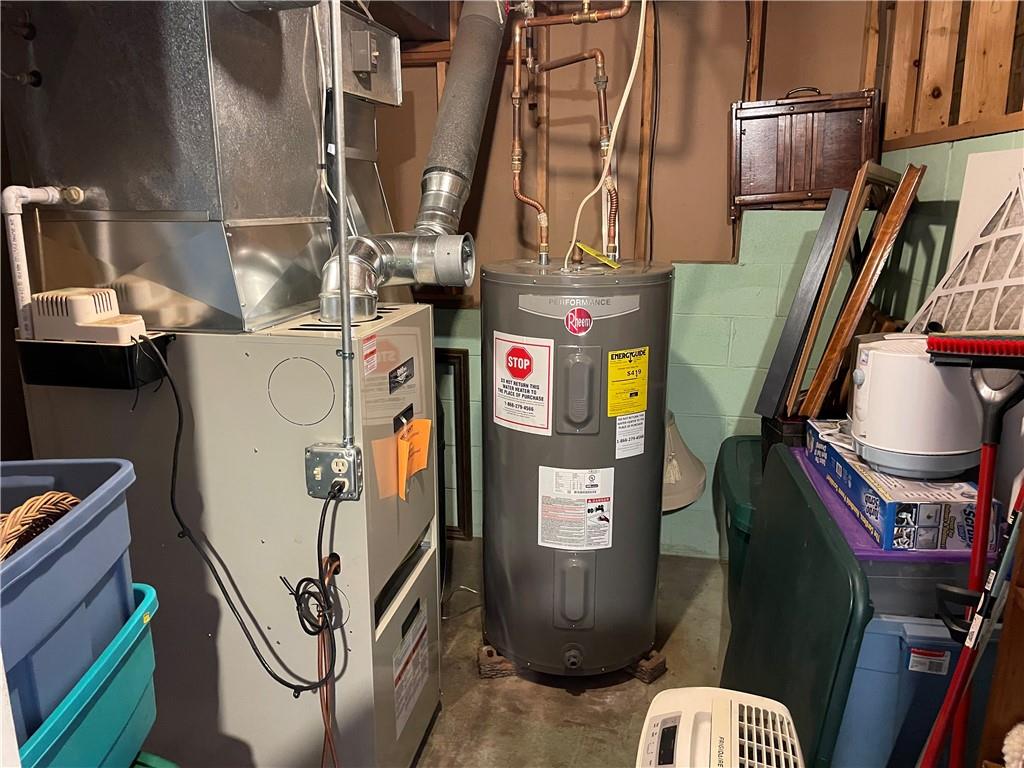 506 Lake Wilhelm Road Sandy Lake, PA 16145 - Photo 33 of 42 a utility room with lots of stuff