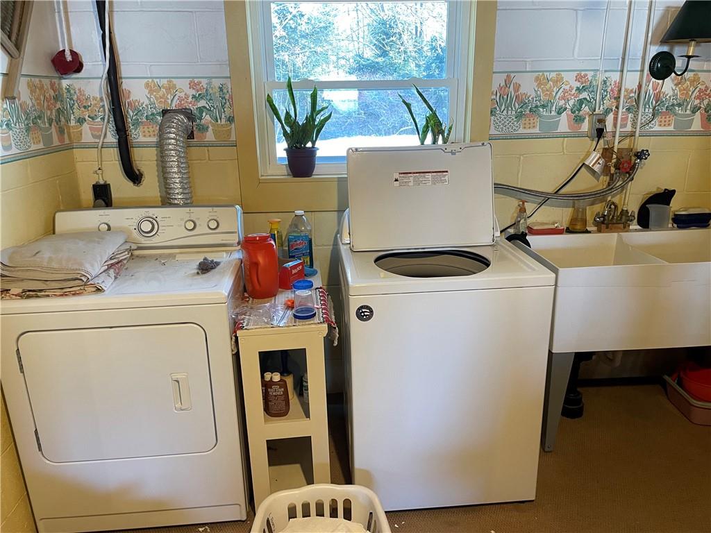 506 Lake Wilhelm Road Sandy Lake, PA 16145 - Photo 34 of 42 a utility room with dryer and washer
