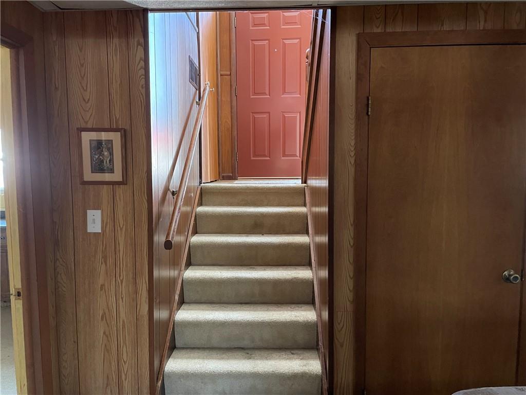 506 Lake Wilhelm Road Sandy Lake, PA 16145 - Photo 39 of 42 a view of staircase with white walls and a window