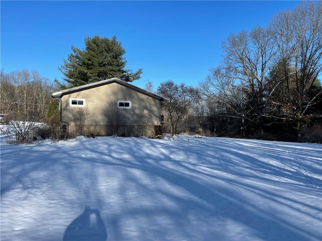 506 Lake Wilhelm Road Sandy Lake, PA 16145 - Photo 7 of 42 a front view of a house with a yard