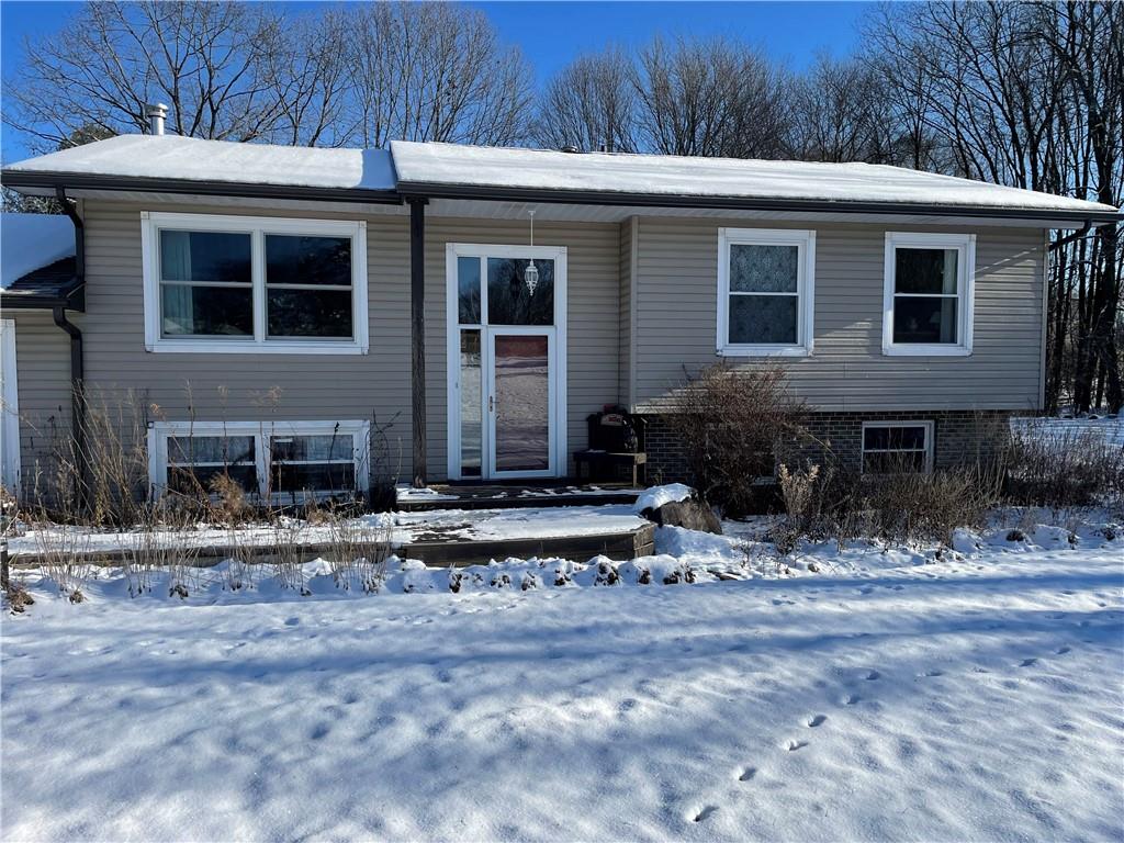506 Lake Wilhelm Road Sandy Lake, PA 16145 - Photo 10 of 42 a view of a house with a yard and sitting area