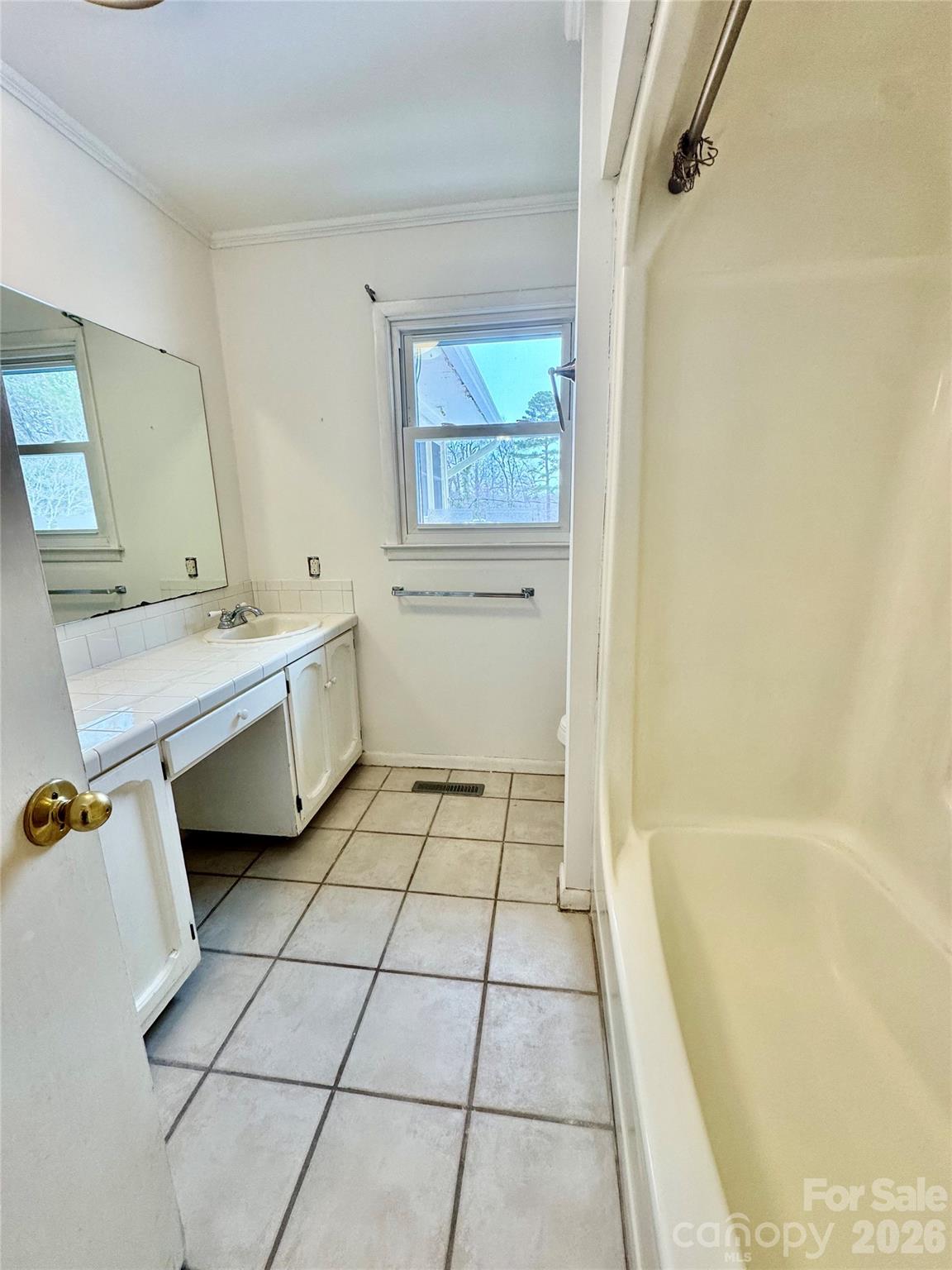 3134 Asbury Church Road Lincolnton, NC 28092 - Photo 10 of 24 a bathroom with a bathtub sink and toilet