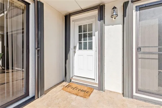 a view of front door with hallway