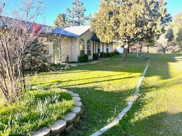 a view of a house with a swimming pool