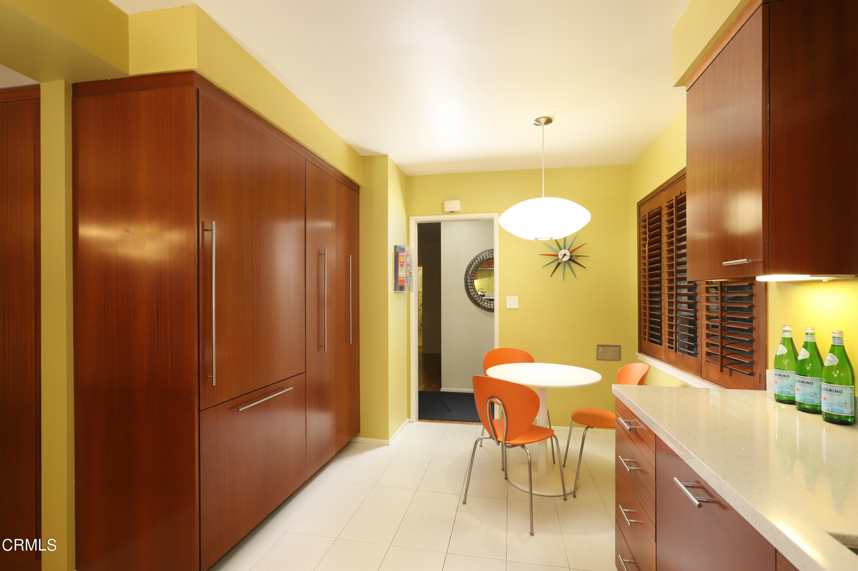 1950 Canyon Close Road Pasadena, CA 91107 - Photo 15 of 48 a view of a room with a dining table and chairs