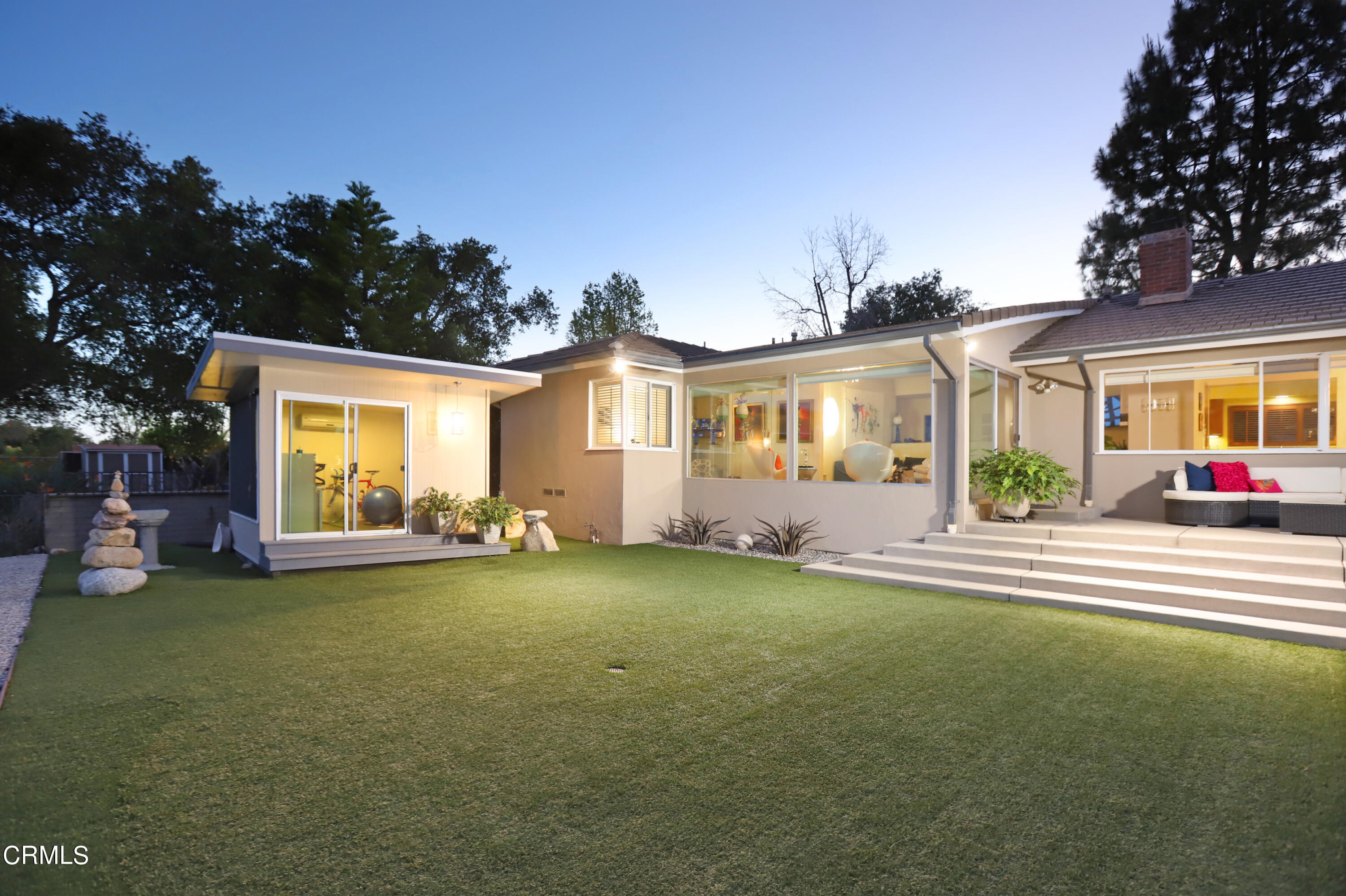 1950 Canyon Close Road Pasadena, CA 91107 - Photo 25 of 48 a front view of a house with a yard and garage