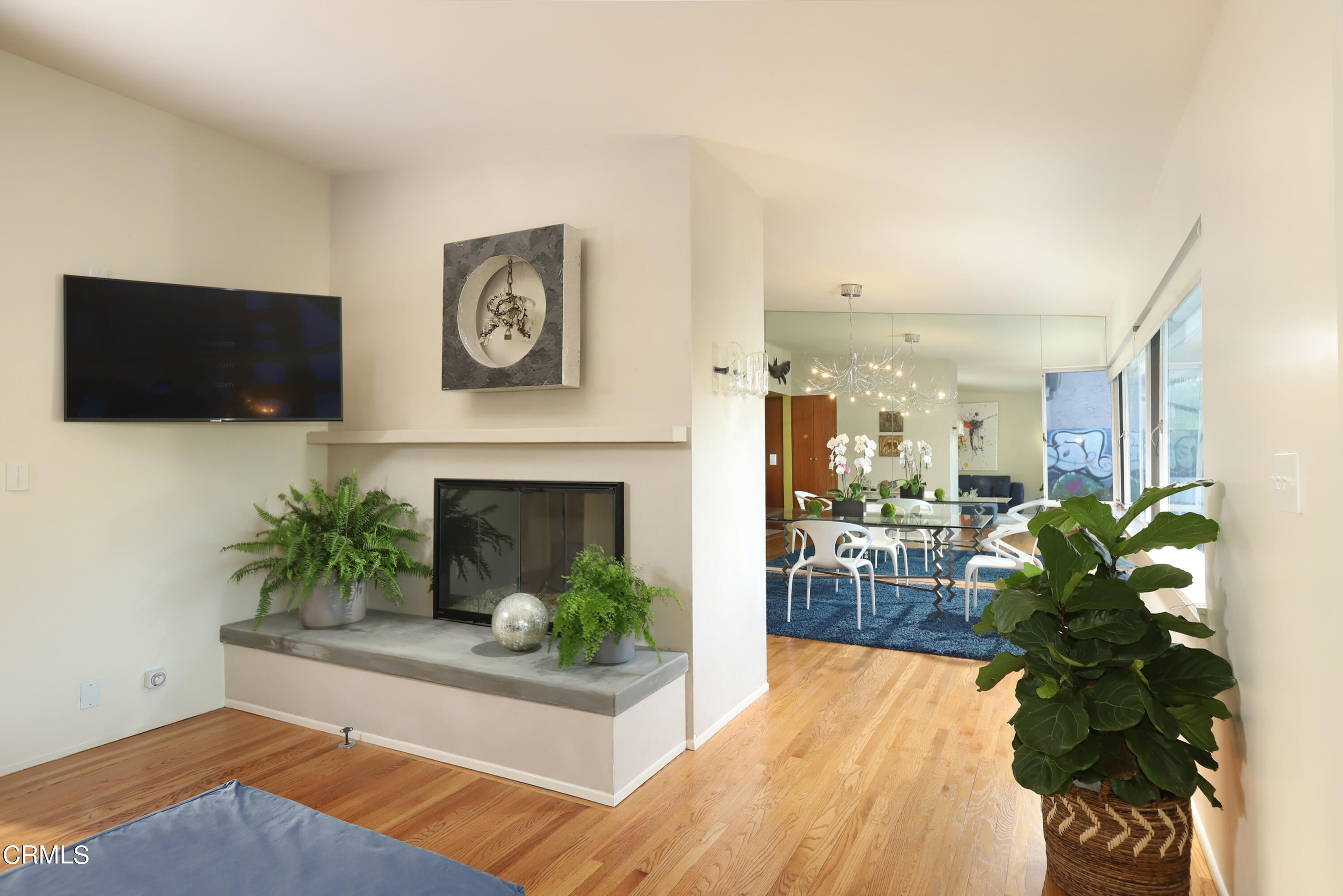 1950 Canyon Close Road Pasadena, CA 91107 - Photo 6 of 48 a living room with furniture a fireplace and a flat screen tv