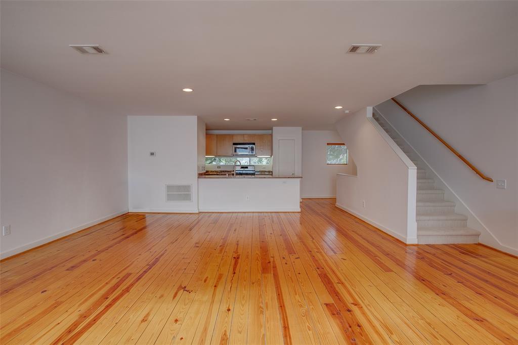 3840 San Jacinto Street Dallas, TX 75204 - Photo 12 of 34 a view of empty room with wooden floor