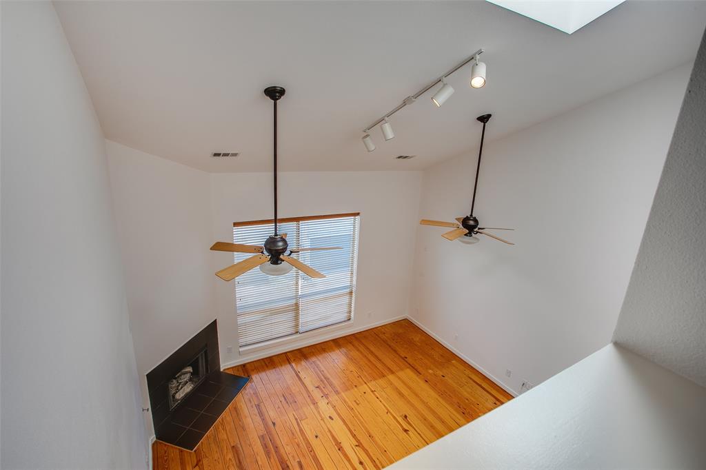 3840 San Jacinto Street Dallas, TX 75204 - Photo 22 of 34 a view of a room with a bed