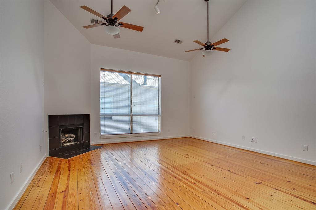 3840 San Jacinto Street Dallas, TX 75204 - Photo 3 of 34 wooden floor in an empty room with a window