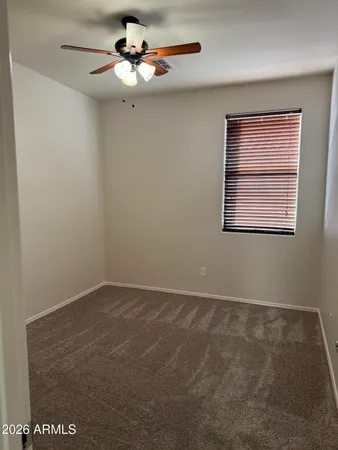 a bathroom with a sink a shower and a mirror