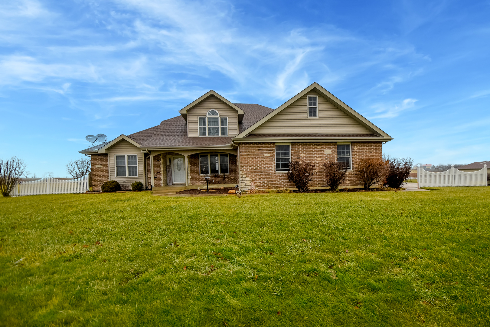 16045 Stateline Road Cedar Lake, IN 46303 - Photo 1 of 36 a front view of a house with a garden and porch