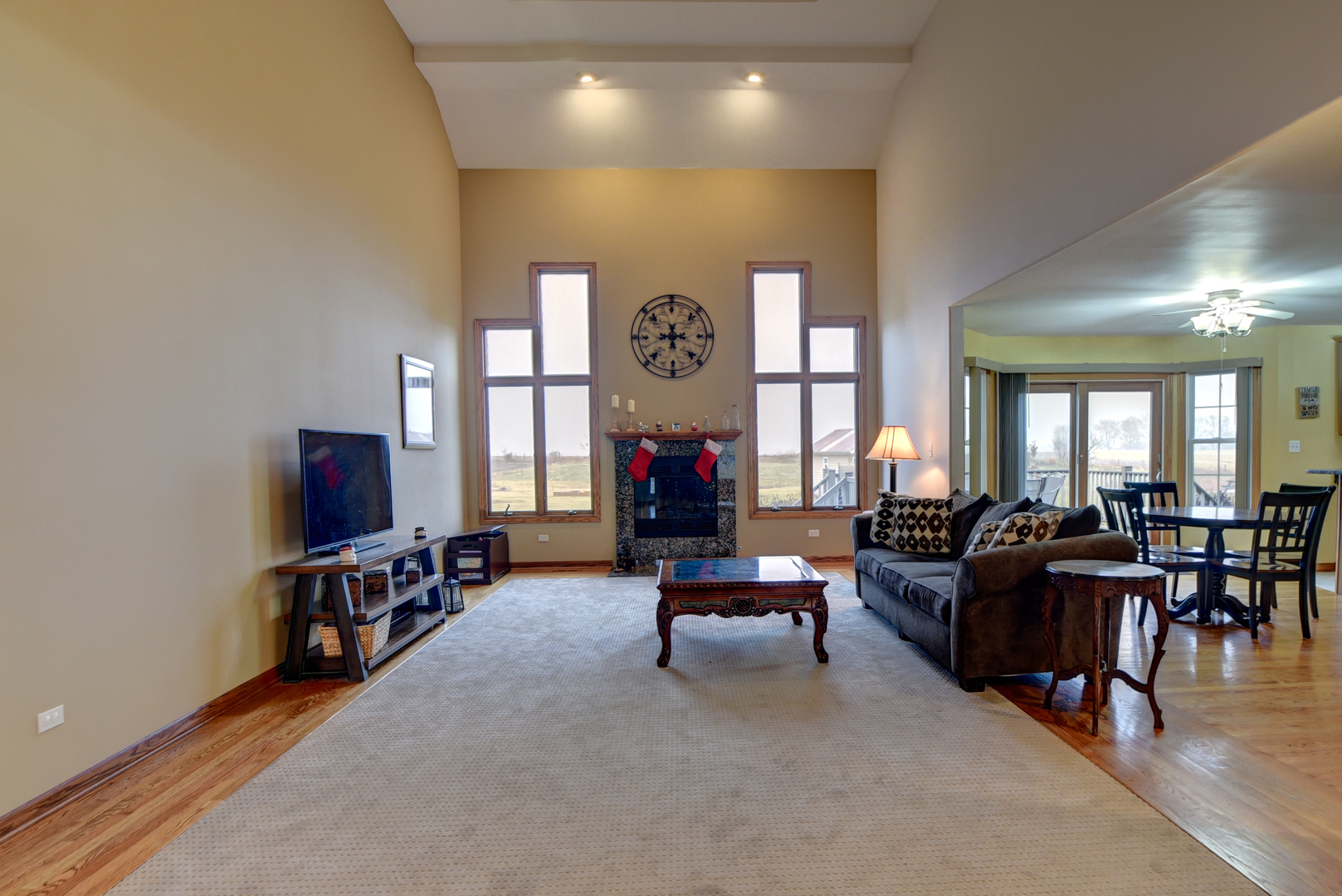 16045 Stateline Road Cedar Lake, IN 46303 - Photo 12 of 36 a living room with fireplace furniture and a flat screen tv