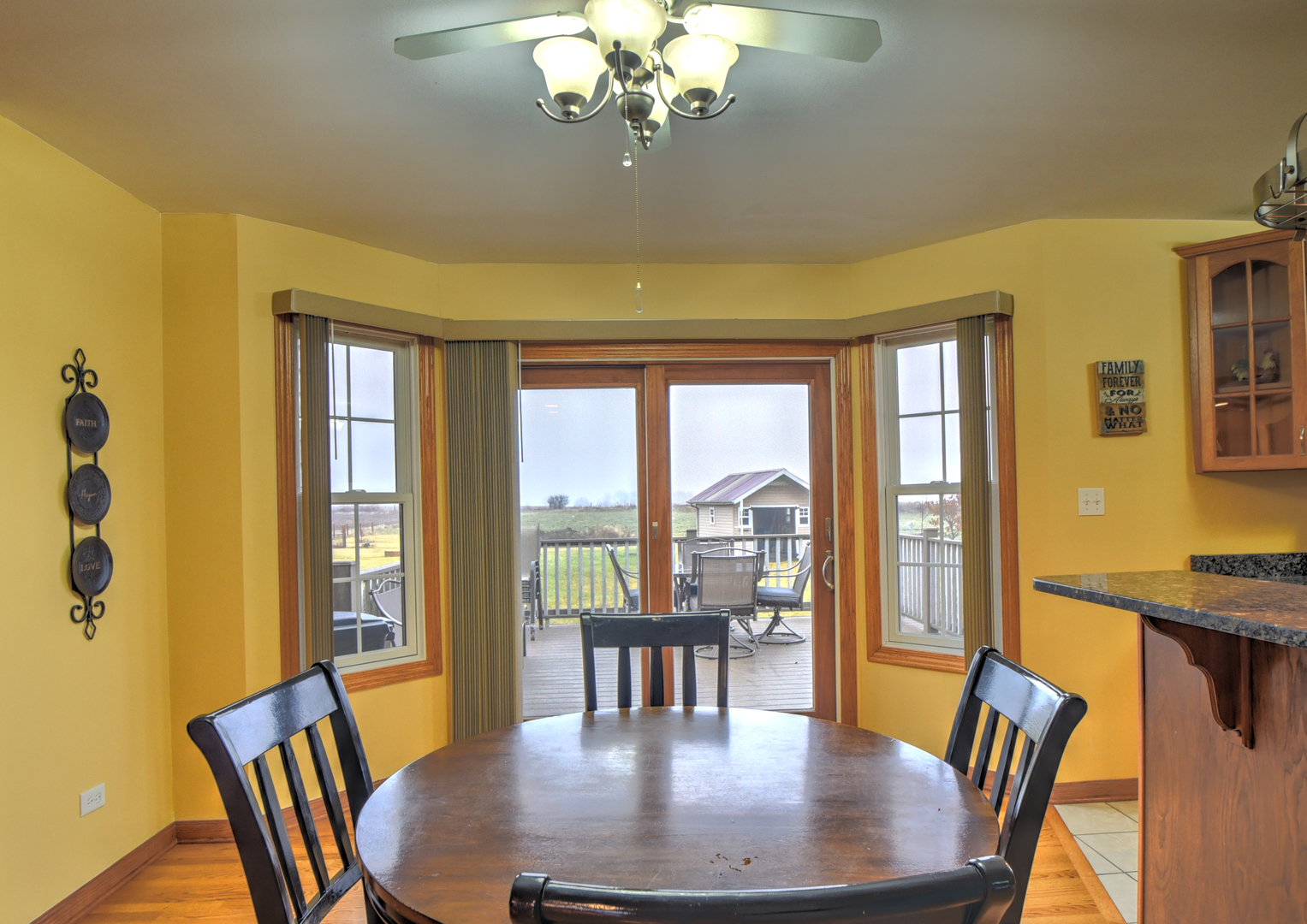 16045 Stateline Road Cedar Lake, IN 46303 - Photo 17 of 36 a view of a dining room with furniture and wooden floor