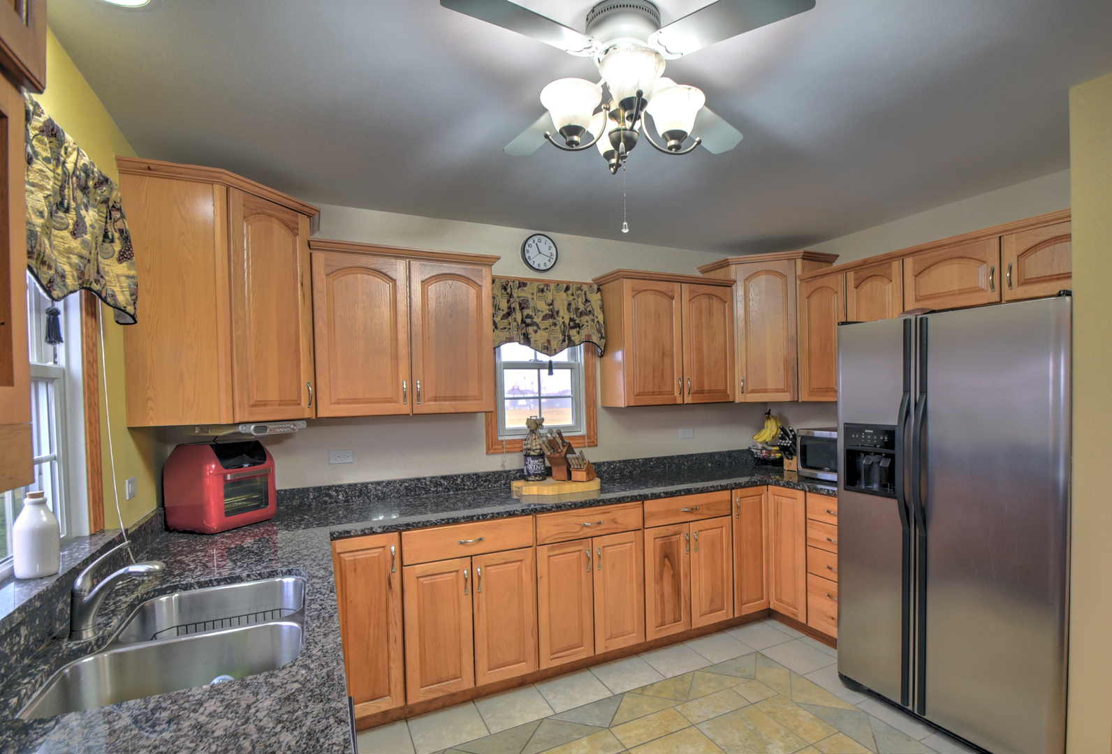 16045 Stateline Road Cedar Lake, IN 46303 - Photo 18 of 36 a kitchen with stainless steel appliances granite countertop a sink refrigerator and cabinets
