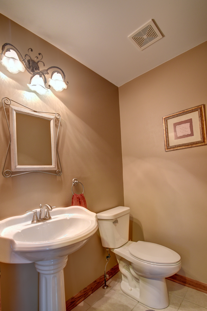 16045 Stateline Road Cedar Lake, IN 46303 - Photo 32 of 36 a bathroom with a sink and a toilet