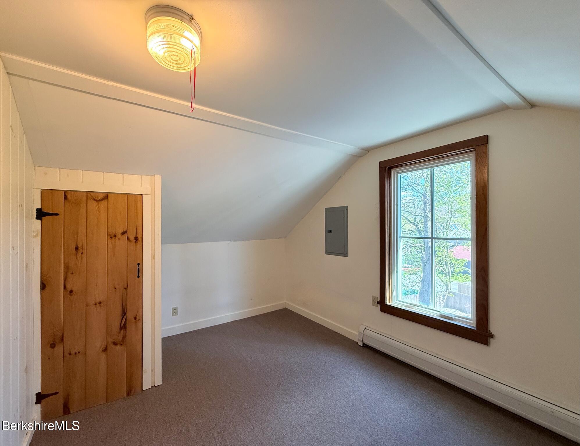 783 Main Street Great Barrington, MA 01230 - Photo 17 of 31 a view of an empty room with a window