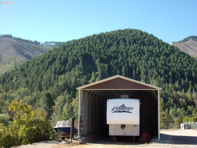 a view of a yard covered in snow