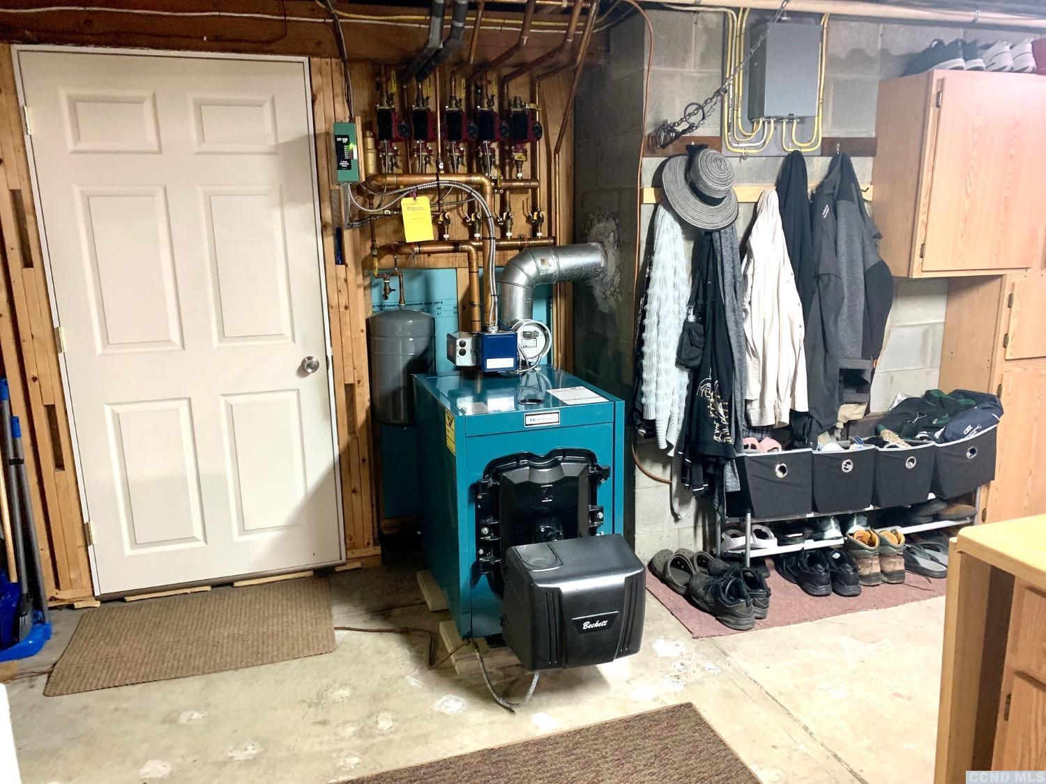160 Willowbrook Road Hudson, NY 12534 - Photo 33 of 48 a view of a living room with furniture and a fireplace