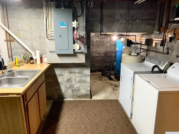 a view of storage and utility room