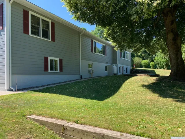 a view of back yard of the house