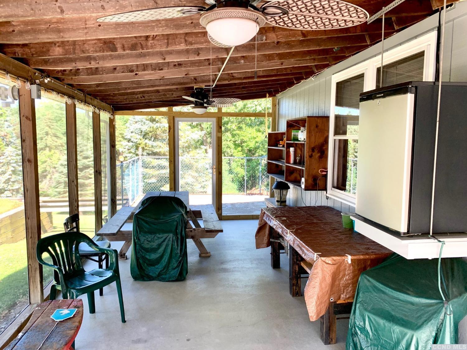 160 Willowbrook Road Hudson, NY 12534 - Photo 41 of 48 a bedroom with furniture and large windows