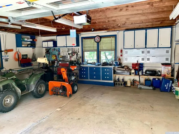 a view of a garage with a tv