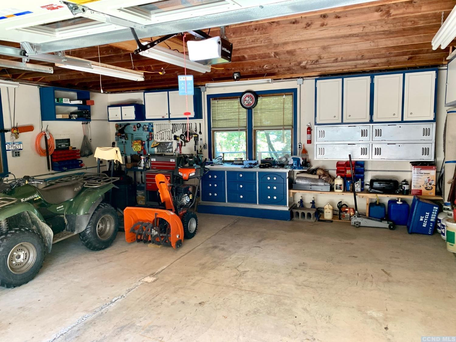 160 Willowbrook Road Hudson, NY 12534 - Photo 42 of 48 a view of a garage with a tv