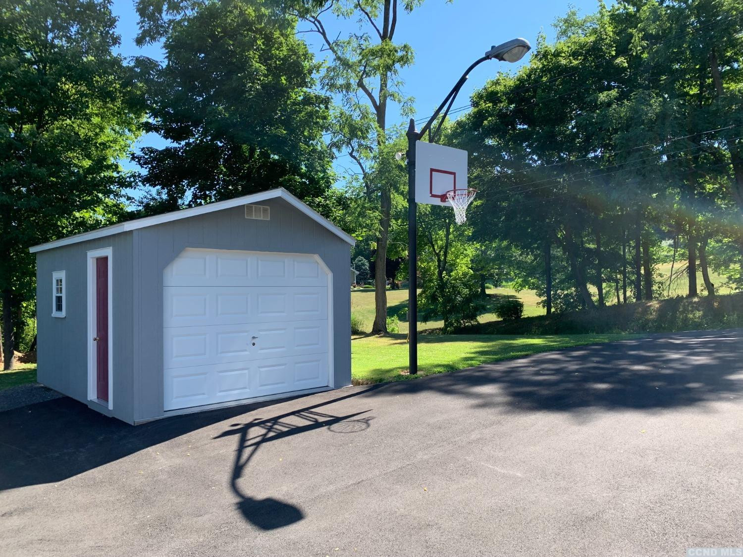 160 Willowbrook Road Hudson, NY 12534 - Photo 45 of 48 a house with trees in front of it