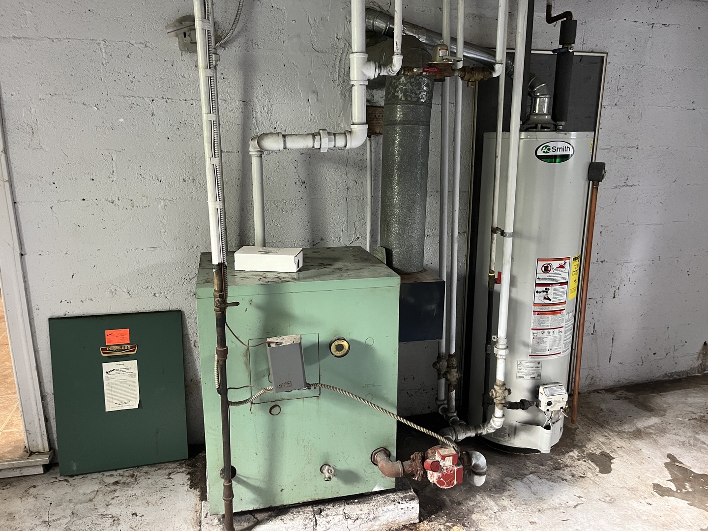 7907 46th Street Lyons, IL 60534 - Photo 16 of 17 a bathroom with a mirror a sink and a shower