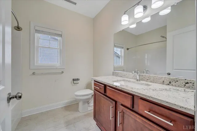 a view of balcony with wooden floor