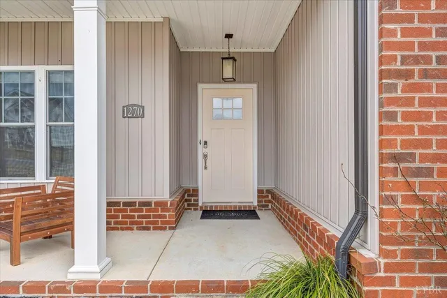 a view of a hallway with windows