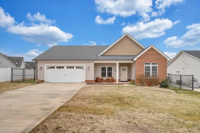 a view of a swimming pool with outdoor seating