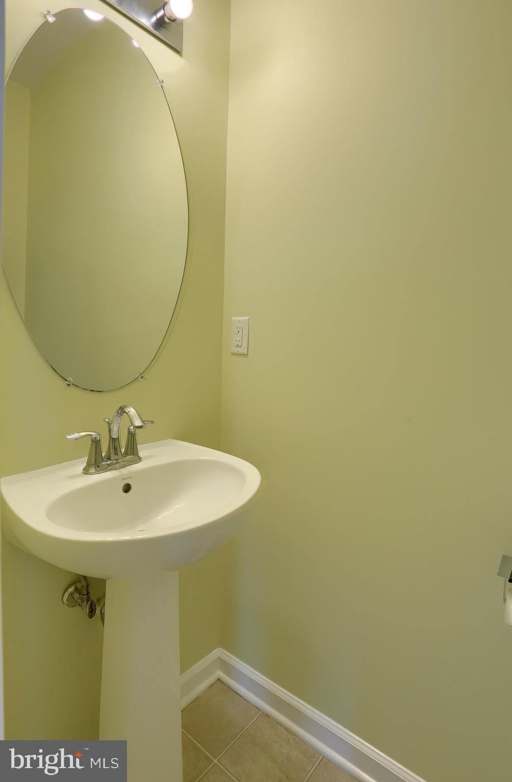 2465 Walnut Bottom Road, Unit 80 York, PA 17408 - Photo 15 of 36 a bathroom with a sink and mirror