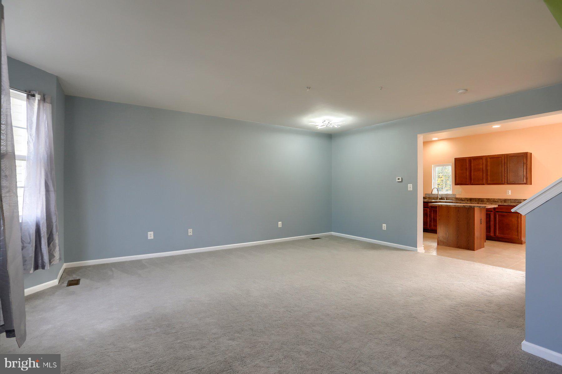 2465 Walnut Bottom Road, Unit 80 York, PA 17408 - Photo 10 of 36 a view of an empty room with a window