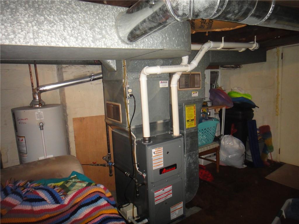 145 Main Street New Eagle, PA 15067 - Photo 20 of 24 a living room with furniture and a fireplace